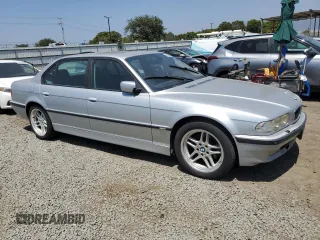 2001 BMW 7 Series 740iL z VIN WBAGH83461DP30331, wystawiony jako Copart lot #62536945 z przebiegiem 121 724 mil mil oraz Czysty tytuł • Clean title. Historia ofert i sprzedaży dostępna na DreamBid. Obrazek 4.