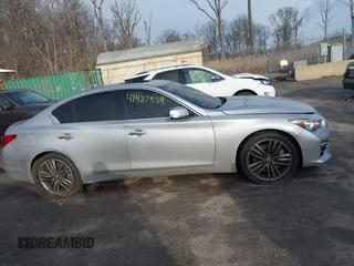 2015 Infiniti Q50 Premium z VIN JN1BV7AR8FM417712, wystawiony jako IAAI lot #41427839 z przebiegiem 88 424 mil mil oraz . Historia ofert i sprzedaży dostępna na DreamBid. Obrazek 12.