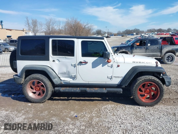 2016 Jeep Wrangler Unlimited Rubicon Hard Rock with VIN 1C4HJWFG9GL296782, listed as a IAAI auction lot 41595273 with 113,338 mi miles. Bid and sale history available at carsss.com. Image 13.