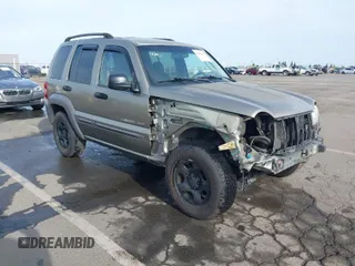 2003 Jeep Liberty Sport with VIN 1J4GL48K63W734415, listed as a IAAI auction lot 42004333 with 141,532 mi miles. Bid and sale history available at carsss.com. Image 1.