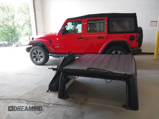 2018 Jeep Wrangler Unlimited Sahara z VIN 1C4HJXEG4JW316496, wystawiony jako IAAI lot #42437607 z przebiegiem 46 861 mil mil oraz . Historia ofert i sprzedaży dostępna na DreamBid. Obrazek 18.