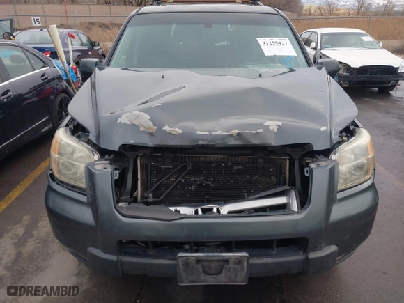 2006 Honda Pilot EX-L with VIN 2HKYF18526H563831, listed as a IAAI auction lot 41255427 with 237,074 mi miles. Bid and sale history available at carsss.com. Image 12.