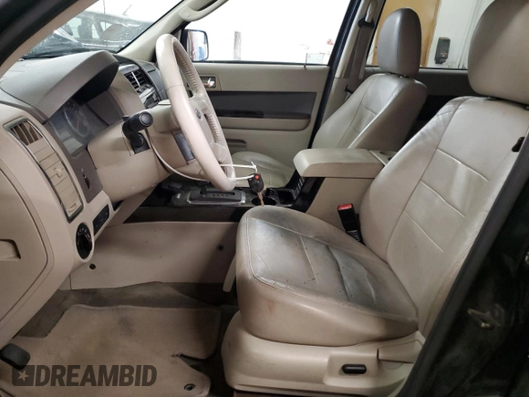 2010 Ford Escape Hybrid with VIN 1FMCU4K30AKC25228, listed as a Copart auction lot 60322835 with 207,629 mi miles and Salvage title. Bid and sale history available at DreamBid. Image 7.