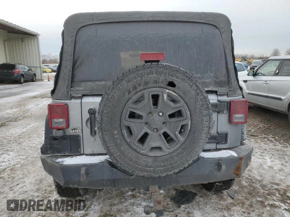 2015 Jeep Wrangler Unlimited Willys Wheeler with VIN 1C4BJWDG9FL516493, listed as a Copart auction lot 45098345 with 152,009 mi miles and Salvage Title. Bid and sale history available at DreamBid. Image 6.