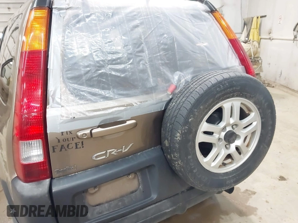 2004 Honda CR-V EX with VIN JHLRD78814C057877, listed as a IAAI auction lot 42065687 with 220,207 mi miles and . Bid and sale history available at carsss.com. Image 6.