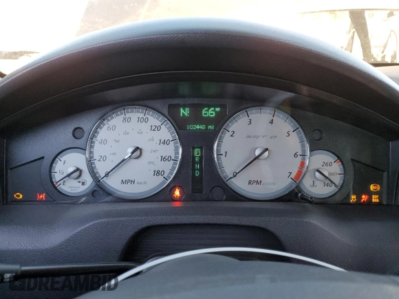 2006 Chrysler 300 C SRT8 with VIN 2C3KA73W06H228944, listed as a Copart auction lot 79866804 with 102,448 mi miles and Salvage Title. Bid and sale history available at carsss.com. Image 9.