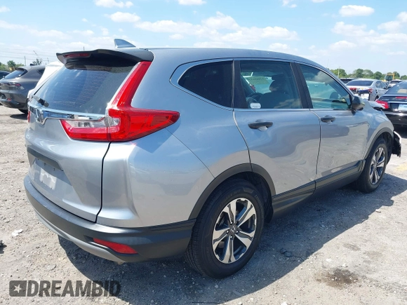 2019 Honda CR-V LX with VIN 2HKRW5H31KH411771, listed as a IAAI auction lot 42060193 with 175,036 mi miles and . Bid and sale history available at DreamBid. Image 4.