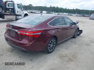 2014 Toyota Avalon Limited z VIN 4T1BK1EB5EU122996, wystawiony jako IAAI lot #42292676 z przebiegiem 157 690 mil mil oraz . Historia ofert i sprzedaży dostępna na DreamBid. Obrazek 4.