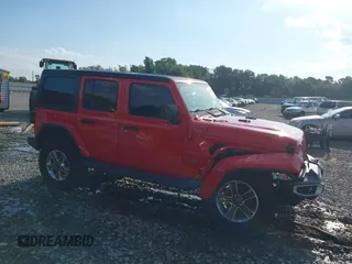 2020 Jeep Wrangler Unlimited Sahara High Altitude with VIN 1C4HJXEG2LW182641, listed as a IAAI auction lot 40130890 with 79,984 mi miles and . Bid and sale history available at DreamBid. Image 13.