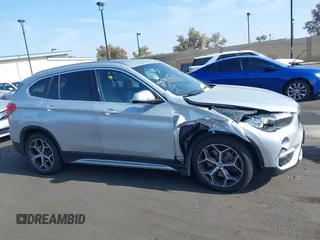 2019 BMW X1 xDrive28i with VIN WBXHT3C56K5L38658, listed as a IAAI auction lot 42496734 with 49,373 mi miles and . Bid and sale history available at DreamBid. Image 13.