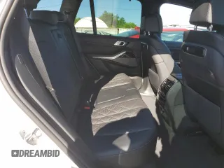 2025 BMW X5 xDrive40i z VIN 5UX23EU08S9Z95423, wystawiony jako Copart lot #55777635 z przebiegiem 695 mil mil oraz Szkoda całkowita • Salvage title. Historia ofert i sprzedaży dostępna na DreamBid. Obrazek 11.