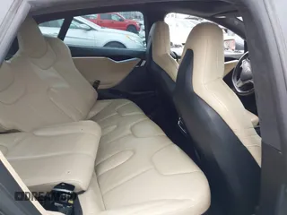 2016 Tesla Model S 90D с VIN 5YJSA1E45GF143853, выставлен на аукционе IAAI как лот 42097333 с пробегом 86 672 миль миль и . История ставок и продаж доступна на DreamBid. Изображение 8.