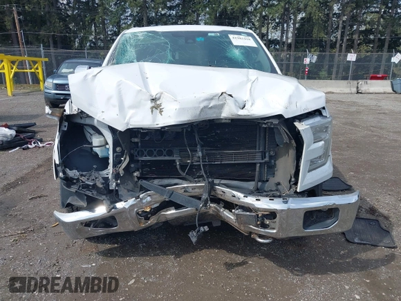 2015 Ford F-150 XLT w/HD Payload Pkg with VIN 1FTFW1EF9FFB93654, listed as a IAAI auction lot 41983418 with 158,754 mi miles. Bid and sale history available at carsss.com. Image 13.