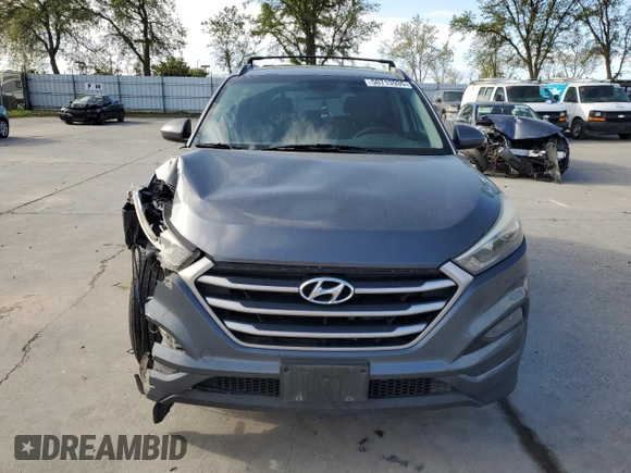 2017 Hyundai Tucson SE with VIN KM8J33A40HU330073, listed as a Copart auction lot 50713935 with 135,673 mi miles and Salvage Title. Bid and sale history available at DreamBid. Image 5.
