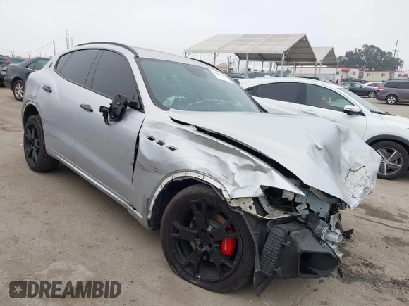 2017 Maserati Levante with VIN ZN661XUSXHX216080, listed as a IAAI auction lot 42024196 with 98,842 mi miles. Bid and sale history available at carsss.com. Image 1.
