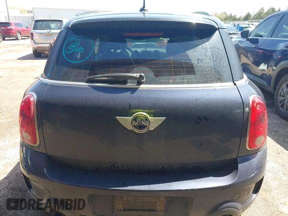 2014 MINI Countryman S with VIN WMWZC3C5XEWP27221, listed as a IAAI auction lot 41957817 with 112,353 mi miles and . Bid and sale history available at DreamBid. Image 17.