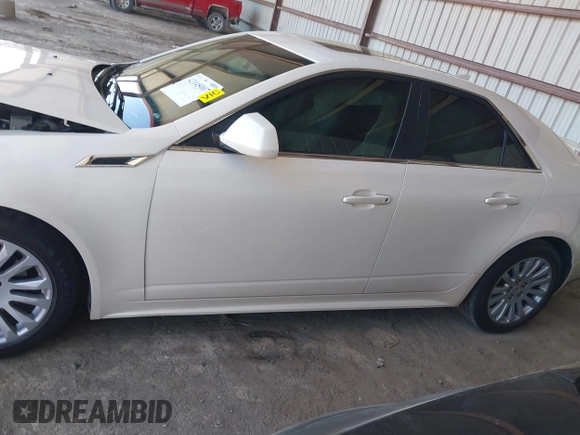 2013 Cadillac CTS Premium z VIN 1G6DS5E30D0105240, wystawiony jako IAAI lot #42145007 z przebiegiem 100 893 mil mil oraz . Historia ofert i sprzedaży dostępna na DreamBid. Obrazek 14.