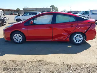 2022 Toyota Prius L Eco with VIN JTDKAMFU0N3161557, listed as a IAAI auction lot 41760623 with 135,934 mi miles. Bid and sale history available at carsss.com. Image 14.