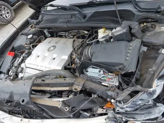 2002 Cadillac DeVille DTS z VIN 1G6KF579320288667, wystawiony jako IAAI lot #42331236 z przebiegiem 71 189 mil mil oraz . Historia ofert i sprzedaży dostępna na DreamBid. Obrazek 10.