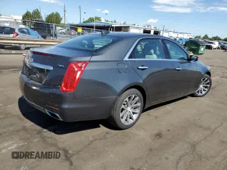 2016 Cadillac CTS Luxury Collection AWD with VIN 1G6AX5SS9G0124616, listed as a Copart auction lot 60116234 with 33,983 mi miles and Clean Title. Bid and sale history available at DreamBid. Image 3.