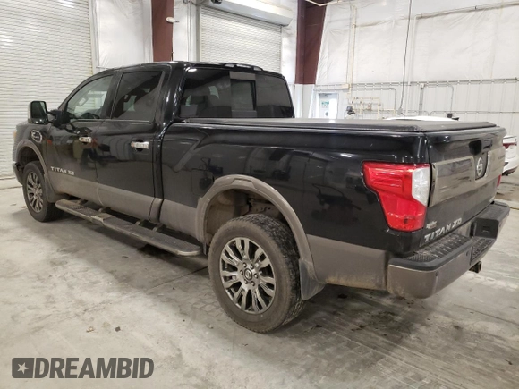 2016 Nissan Titan XD Platinum Reserve with VIN 1N6BA1F49GN517376, listed as a Copart auction lot 81189484 with 147,435 mi miles and Salvage Title. Bid and sale history available at carsss.com. Image 2.