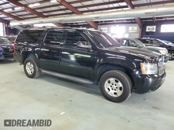 2014 Chevrolet Suburban LT with VIN 1GNSKJE77ER131290, listed as a Copart auction lot 71351994 with 258,058 mi miles and Clean Title. Bid and sale history available at carsss.com. Image 4.
