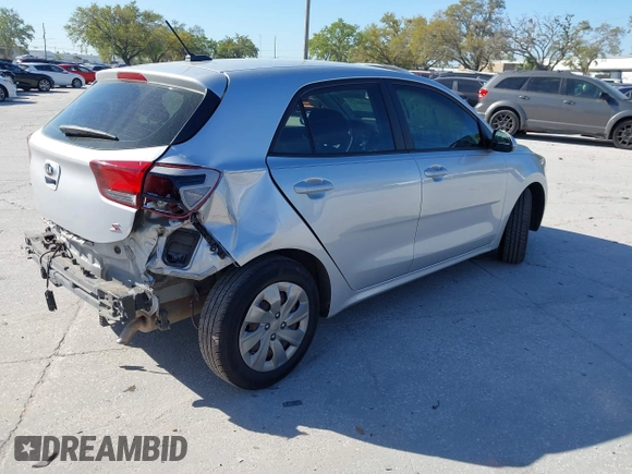 2020 Kia Rio S with VIN 3KPA25AD4LE309303, listed as a IAAI auction lot 41800912 with 75,393 mi miles and . Bid and sale history available at DreamBid. Image 4.