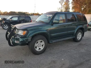 1999 Toyota 4Runner Limited with VIN JT3GN87R0X0102724, listed as a Copart auction lot 80895244 with 382,902 mi miles and Salvage Title. Bid and sale history available at DreamBid. Image 1.