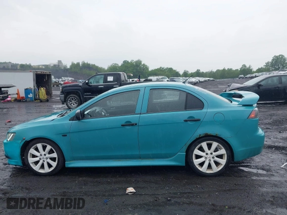 2013 Mitsubishi Lancer GT with VIN JA32U8FW6DU022878, listed as a IAAI auction lot 42449708 with 121,869 mi miles and . Bid and sale history available at DreamBid. Image 14.