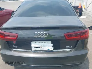 2016 Audi A6 Premium Plus with VIN WAUGFAFCXGN014941, listed as a IAAI auction lot 42566044 with 162,659 mi miles and . Bid and sale history available at DreamBid. Image 16.