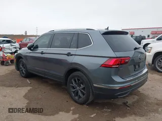 2024 Volkswagen Tiguan SE with VIN 3VV3B7AX2RM068498, listed as a IAAI auction lot 41531195 with 14,778 mi miles and . Bid and sale history available at DreamBid. Image 3.
