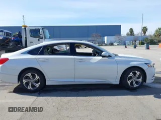 2018 Honda Accord EX-L z VIN 1HGCV1F52JA083242, wystawiony jako IAAI lot #41544446 z przebiegiem 22 387 mil mil oraz . Historia ofert i sprzedaży dostępna na DreamBid. Obrazek 13.