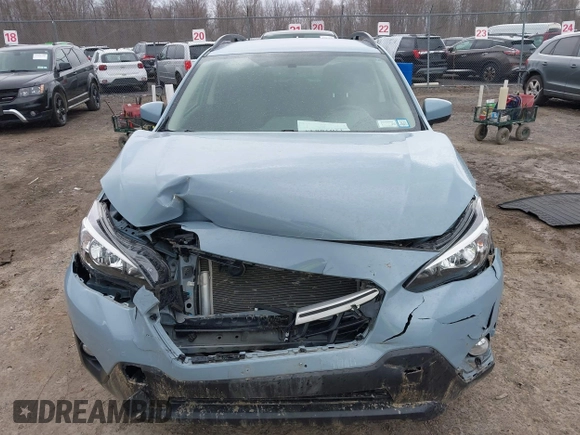 2022 Subaru Crosstrek Premium z VIN JF2GTACC4NG279633, wystawiony jako IAAI lot #42028843 z przebiegiem 38 450 mil mil oraz . Historia ofert i sprzedaży dostępna na DreamBid. Obrazek 6.
