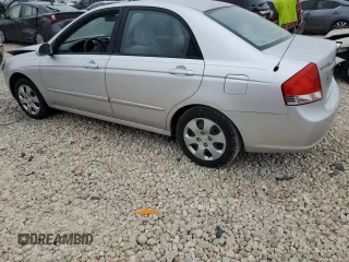 2009 Kia Spectra SX with VIN KNAFE221195656606, listed as a Copart auction lot 84694524 with Not Provided miles and Salvage Title. Bid and sale history available at carsss.com. Image 2.