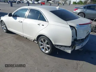 2014 Cadillac ATS Luxury RWD with VIN 1G6AB5RX7E0184424, listed as a IAAI auction lot 41891908 with 132,658 mi miles. Bid and sale history available at carsss.com. Image 3.