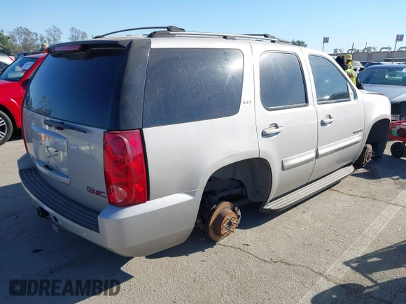 2007 GMC Yukon SLE with VIN 1GKFK130X7J131757, listed as a IAAI auction lot 41237779 with 156,148 mi miles. Bid and sale history available at carsss.com. Image 4.
