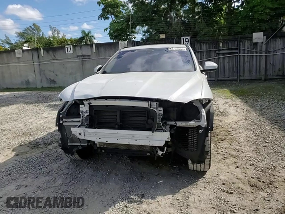2020 Jaguar F-Pace 25t Checkered Flag Edition with VIN SADCP2FXXLA618597, listed as a Copart auction lot 43703065 with 32,011 mi miles and Salvage title. Bid and sale history available at DreamBid. Image 12.