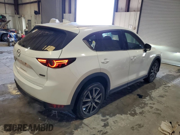 2018 Mazda CX-5 Grand Touring with VIN JM3KFADM3J1429016, listed as a Copart auction lot 45318885 with 162,112 mi miles and Salvage Title. Bid and sale history available at carsss.com. Image 3.