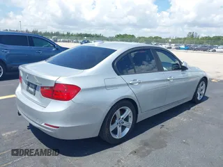 2013 BMW 3 Series 328i with VIN WBA3C1G50DNN93277, listed as a IAAI auction lot 42448381 with 83,758 mi miles and . Bid and sale history available at DreamBid. Image 4.
