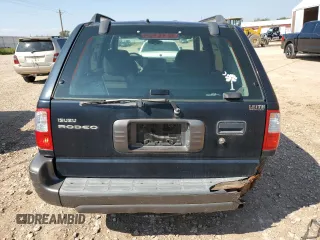 2003 Isuzu Rodeo with VIN 4S2CK58W634313617, listed as a Copart auction lot 70144664 with 179,921 mi miles and Clean Title. Bid and sale history available at DreamBid. Image 6.