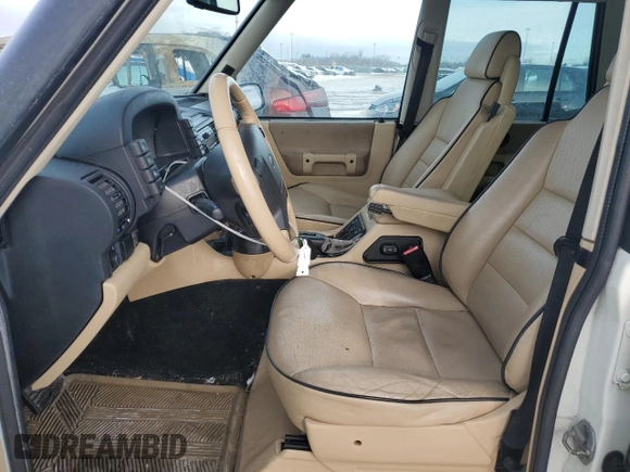 2004 Land Rover Discovery SE z VIN SALTW19494A839791, wystawiony jako Copart lot #45903105 z przebiegiem 139 847 mil mil oraz Czysty tytuł • Clean title. Historia ofert i sprzedaży dostępna na DreamBid. Obrazek 7.