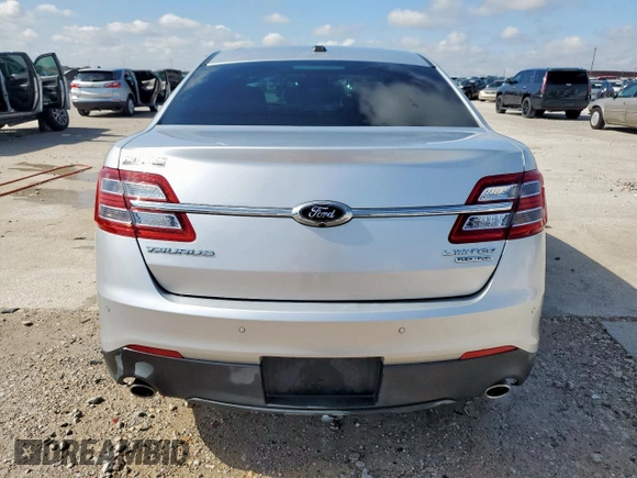 2013 Ford Taurus Limited with VIN 1FAHP2F84DG129904, listed as a Copart auction lot 58218205 with 105,877 mi miles and Salvage title. Bid and sale history available at DreamBid. Image 6.