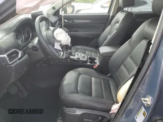 2024 Mazda CX-5 S Carbon Edition z VIN JM3KFBCL2R0521170, wystawiony jako Copart lot #53203485 z przebiegiem Nie podano mil oraz Nie do naprawy. Historia ofert i sprzedaży dostępna na DreamBid. Obrazek 7.