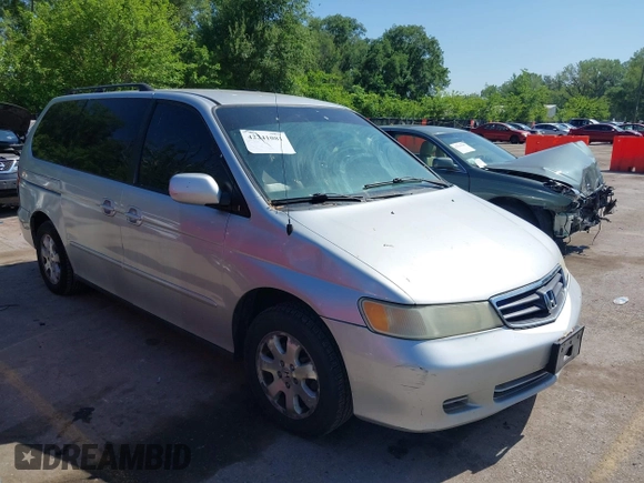2004 Honda Odyssey EX-L with VIN 5FNRL18934B018040, listed as a IAAI auction lot 42241081 with 250,607 mi miles and . Bid and sale history available at DreamBid. Image 1.