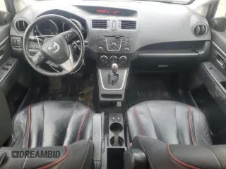 2012 Mazda 5 Grand Touring z VIN JM1CW2DL1C0120292, wystawiony jako Copart lot #59389225 z przebiegiem 222 038 mil mil oraz Czysty tytuł • Clean title. Historia ofert i sprzedaży dostępna na DreamBid. Obrazek 8.