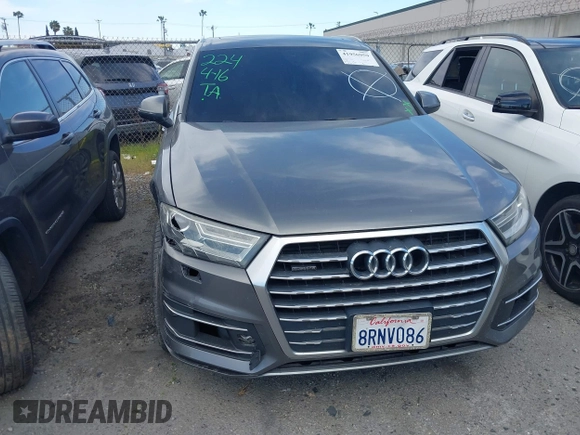 2017 Audi Q7 Premium with VIN WA1AAAF71HD010675, listed as a IAAI auction lot 41956959 with 136,549 mi miles and . Bid and sale history available at DreamBid. Image 13.