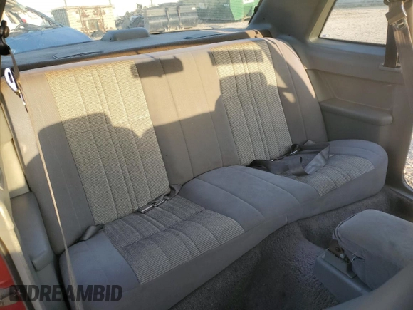 1988 Ford Thunderbird with VIN 1FABP6041JH103866, listed as a Copart auction lot 51694165 with 94,935 mi miles and Salvage Title. Bid and sale history available at carsss.com. Image 11.