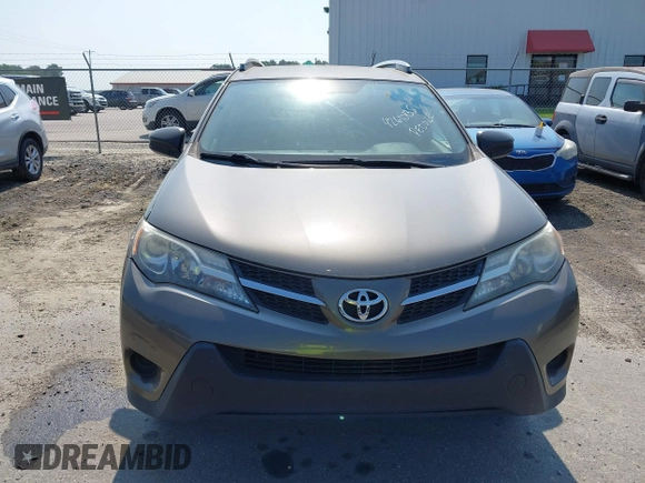 2014 Toyota RAV4 LE with VIN JTMZFREVXED034316, listed as a IAAI auction lot 42610135 with 214,871 mi miles and . Bid and sale history available at DreamBid. Image 13.