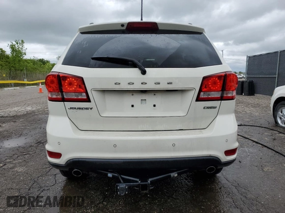2013 Dodge Journey Crew with VIN 3C4PDCDG9DT537552, listed as a Copart auction lot 58126615 with 96,884 mi miles and Salvage title. Bid and sale history available at DreamBid. Image 6.