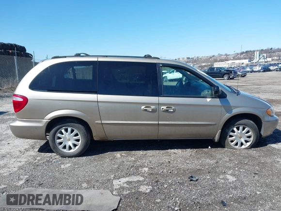 2002 Chrysler Town & Country EX with VIN 2C8GP74LX2R573857, listed as a IAAI auction lot 41846302 with Not Provided miles and . Bid and sale history available at carsss.com. Image 12.